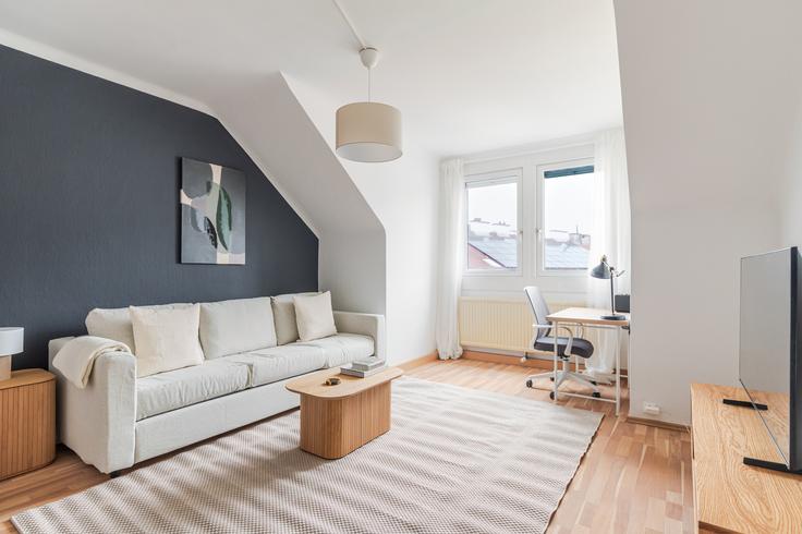 Sala de estar elegantemente projetada com móveis modernos em um apartamento no Marxergasse 22 em Vienna, Vienna Sala de estar elegantemente projetada com móveis modernos em um apartamento no Marxergasse 22 em Vienna, Vienna