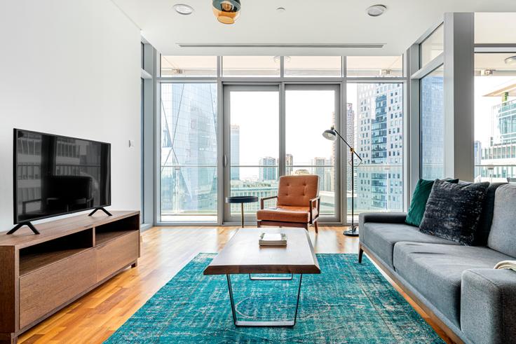 Elegantly designed living room with modern furnishings in an apartment at 929 mass ave in Trade Center, Dubai