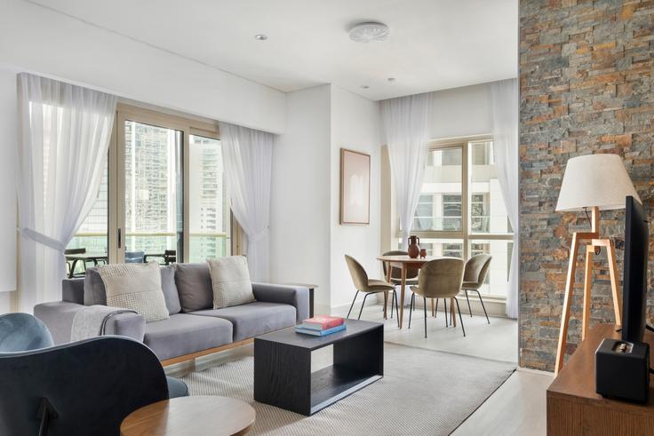 Elegantly designed living room with modern furnishings in an apartment at The Royal Oceanic in Dubai Marina, Dubai