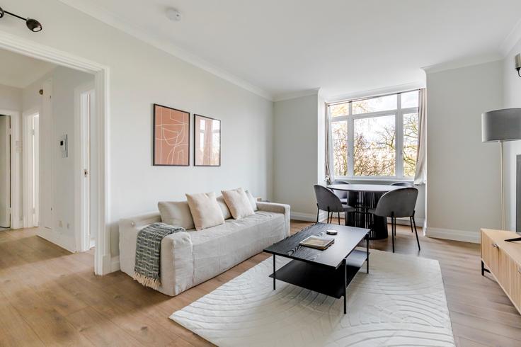Elegantly designed living room with modern furnishings in an apartment at Apartment in Royal Borough of Kensington and Chelsea, London