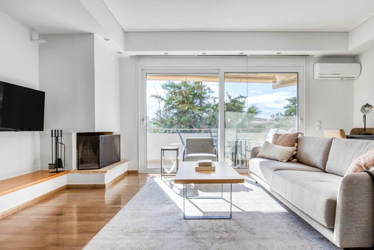 Chic living room with minimalist design from a furnished apartment in Vrilissia, Athens