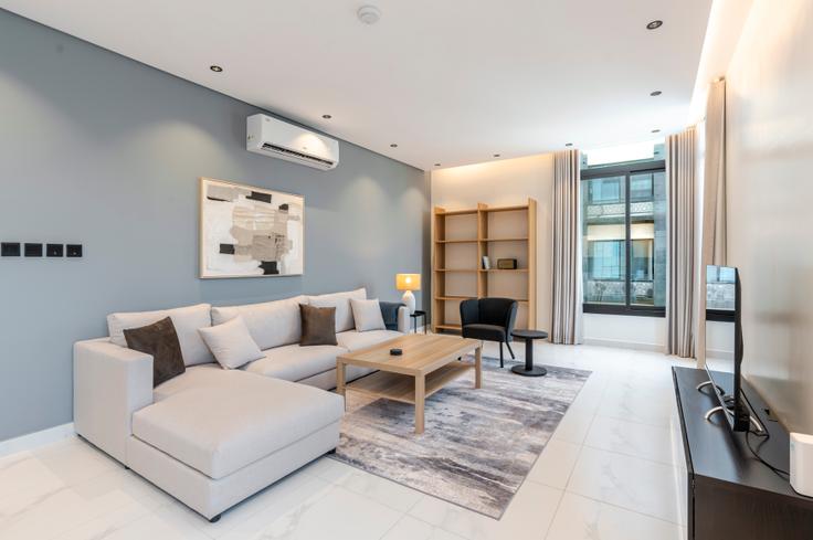 Elegante sala de estar con mobiliario moderno en un apartamento en 4058 Abdul Rahman Al Halawani en Jeddah, Jeddah Elegante sala de estar con mobiliario moderno en un apartamento en 4058 Abdul Rahman Al Halawani en Jeddah, Jeddah