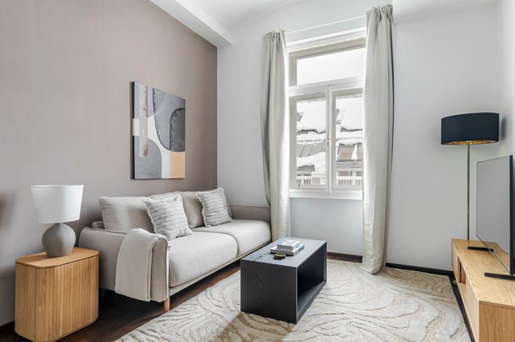Elegantly designed living room with modern furnishings in an apartment at Münzgasse 5 in Vienna, Vienna Elegantly designed living room with modern furnishings in an apartment at Münzgasse 5 in Vienna, Vienna