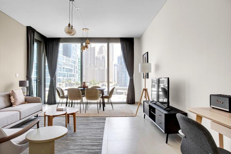 Elegantly designed living room with modern furnishings in an apartment at 52|42 Tower 1 in 52|42 Tower, Dubai