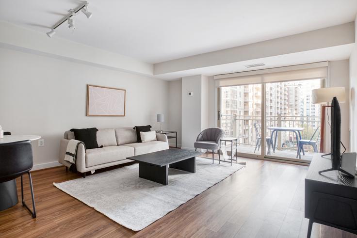 Elegantly designed living room with modern furnishings in an apartment at Randolph Towers in Ballston, Washington D.C.