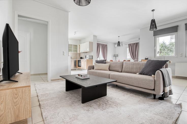 Salle de séjour élégante avec mobilier moderne dans un appartement à Vrilission II à North Athens, Athens Salle de séjour élégante avec mobilier moderne dans un appartement à Vrilission II à North Athens, Athens