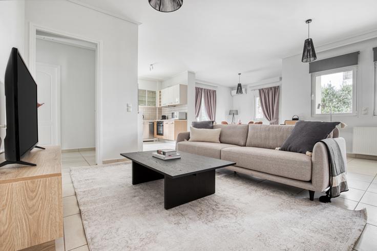 Elegantly designed living room with modern furnishings in an apartment at Vrilission II in Chalandri, Athens