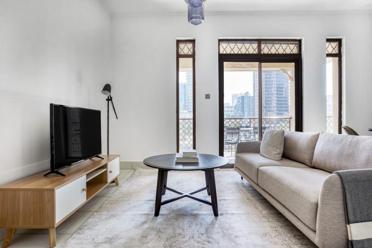 Elegantly designed living room with modern furnishings in an apartment at Northpoint apartments in Downtown Dubai, Dubai