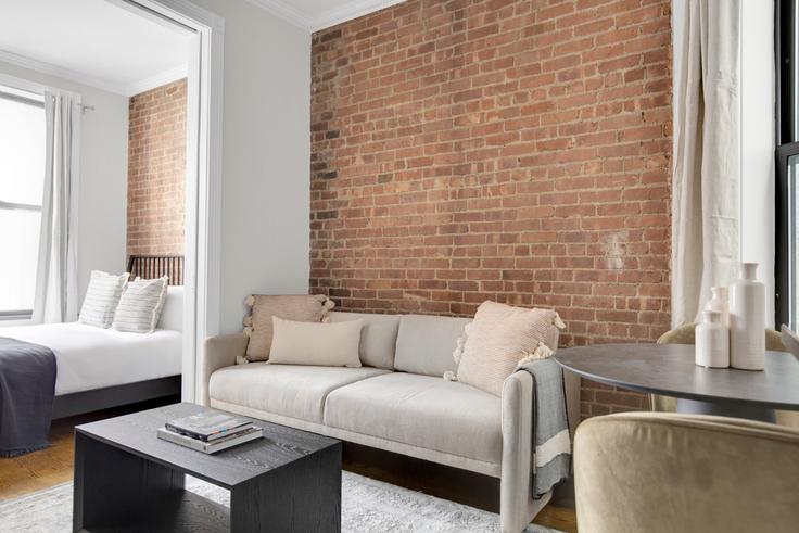 Elegantly designed living room with modern furnishings in an apartment at 209 East 25th Street in Gramercy Park, New York