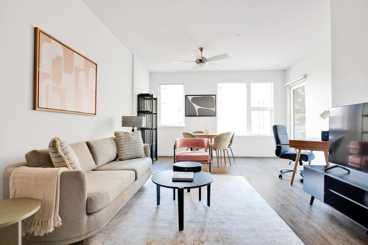 Elegantly designed living room with modern furnishings in an apartment at AMLI South Lake Union in South Lake Union, Seattle