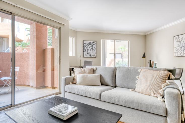 Elegantly designed living room with modern furnishings in an apartment at Avalon Woodland Hills - 20540 Ventura Blvd. in Woodland Hills, Los Angeles