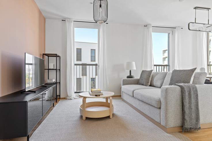 Elegantly designed living room with modern furnishings in an apartment at Donaumarina Stiege 2 in Vienna, Vienna