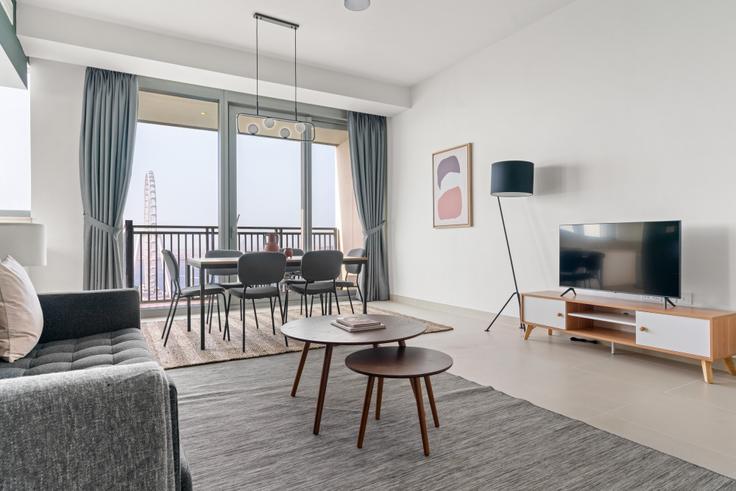Salle de séjour élégante avec mobilier moderne dans un appartement à 52|42 tower à Dubai Marina, Dubai Salle de séjour élégante avec mobilier moderne dans un appartement à 52|42 tower à Dubai Marina, Dubai