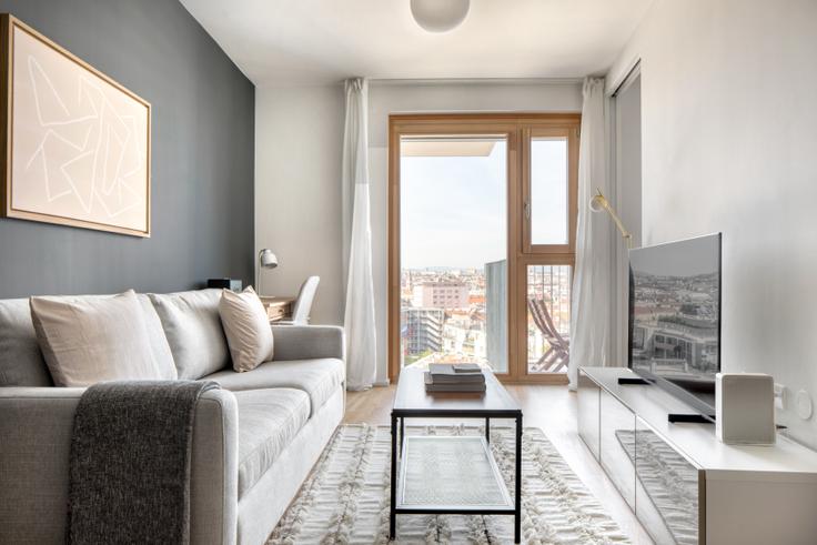 Salle de séjour élégante avec mobilier moderne dans un appartement à Metropolitan à 10th district - Favoriten, Vienna