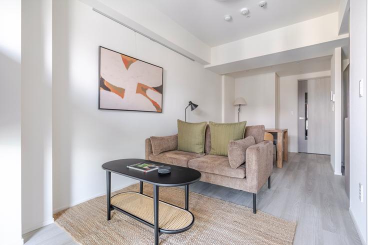 Salle de séjour élégante avec mobilier moderne dans un appartement à Brillia ist  Asakusa à Taito City, Tokyo