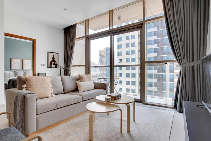 Elegantly designed living room with modern furnishings in an apartment at No.9 in No. 9, Dubai