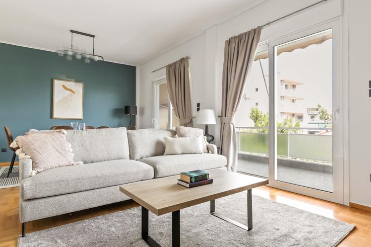 Chic living room with minimalist design from a furnished apartment in Cholargos, Athens