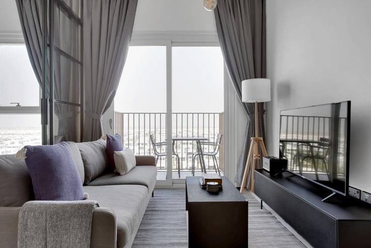 Salle de séjour élégante avec mobilier moderne dans un appartement à Collective 1 à Dubai Hills Estate, Dubai Salle de séjour élégante avec mobilier moderne dans un appartement à Collective 1 à Dubai Hills Estate, Dubai