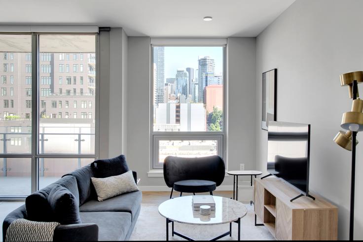 Avalon belltown towers adresindeki bir dairede modern mobilyalarla zarif bir şekilde tasarlanmış oturma odası Seattle, Seattle Avalon belltown towers adresindeki bir dairede modern mobilyalarla zarif bir şekilde tasarlanmış oturma odası Seattle, Seattle