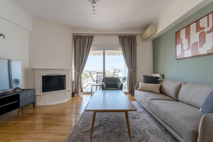 Salle de séjour élégante avec mobilier moderne dans un appartement à Ippodamou II à Central Athens, Athens Salle de séjour élégante avec mobilier moderne dans un appartement à Ippodamou II à Central Athens, Athens