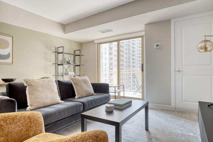 Elegantly designed living room with modern furnishings in an apartment at Randolph Towers in Ballston, Washington D.C.