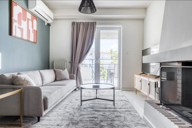 Salle de séjour élégante avec mobilier moderne dans un appartement à Anatolis I à Agia Paraskevi, Athens