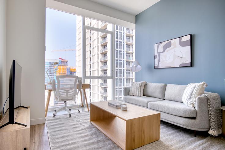 Elegantly designed living room with modern furnishings in an apartment at 1407 On Michigan in South Loop, Chicago