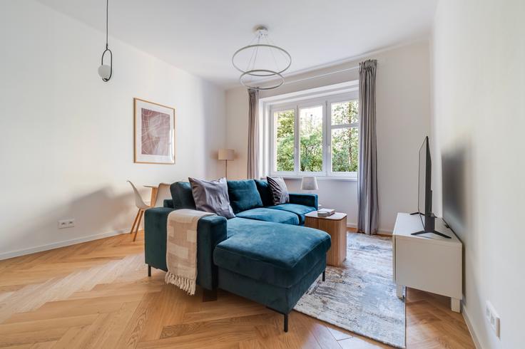 Salle de séjour élégante avec mobilier moderne dans un appartement à Baranova 1832/13, 130 00 Žižkov à Prague 2, Prague Salle de séjour élégante avec mobilier moderne dans un appartement à Baranova 1832/13, 130 00 Žižkov à Prague 2, Prague