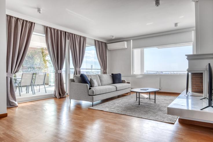 Chic living room with minimalist design from a furnished apartment in Nea Smyrni, Athens