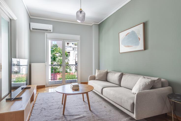 Salle de séjour élégante avec mobilier moderne dans un appartement à Alios 9 Athens à Central Athens, Athens