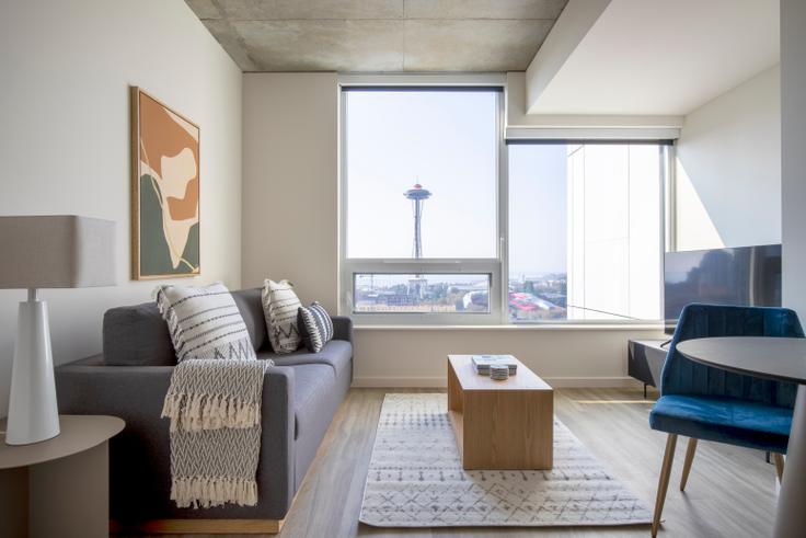 Elegantly designed living room with modern furnishings in an apartment at The Waverly in South Lake Union, Seattle