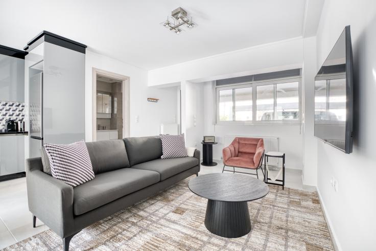 Chic living room with minimalist design from a furnished apartment in Chalandri, Athens