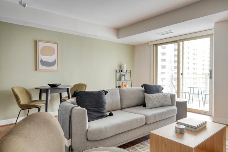 Elegantly designed living room with modern furnishings in an apartment at Randolph Towers in Ballston, Washington D.C.