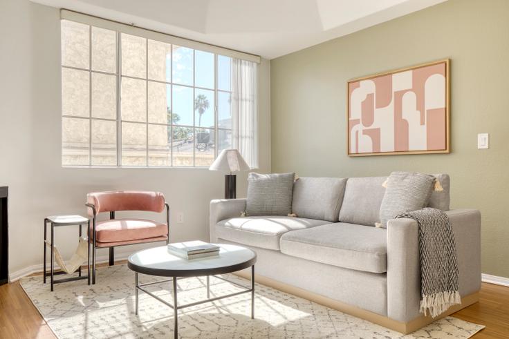 Elegantly designed living room with modern furnishings in an apartment at 114 N. Doheny Drive in Beverly Hills, Los Angeles