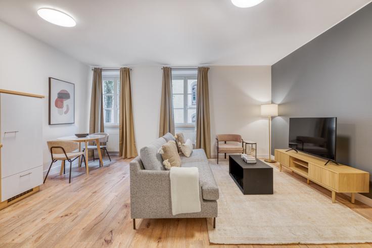 Elegantly designed living room with modern furnishings in an apartment at ST ULRIC 9 in Grund, Luxembourg