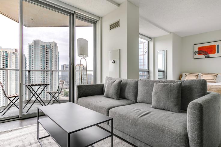 Elegantly designed living room with modern furnishings in an apartment at Left Bank in Chicago, Chicago Elegantly designed living room with modern furnishings in an apartment at Left Bank in Chicago, Chicago