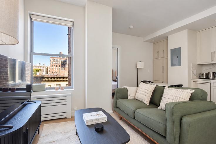 Elegantly designed living room with modern furnishings in an apartment at 915 West End Avenue in Manhattan, New York Elegantly designed living room with modern furnishings in an apartment at 915 West End Avenue in Manhattan, New York