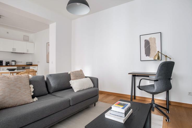 Elegantly designed living room with modern furnishings in an apartment at Winsstraße in Prenzlauer Berg, Berlin