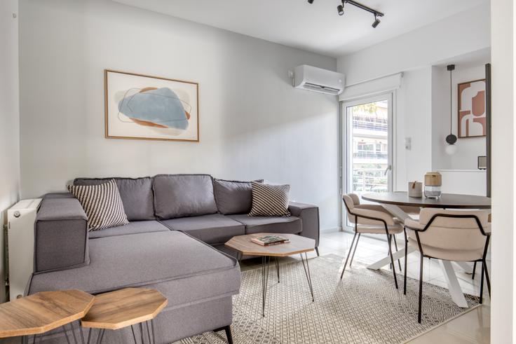 Chic living room with minimalist design from a furnished apartment in Agia Paraskevi, Athens