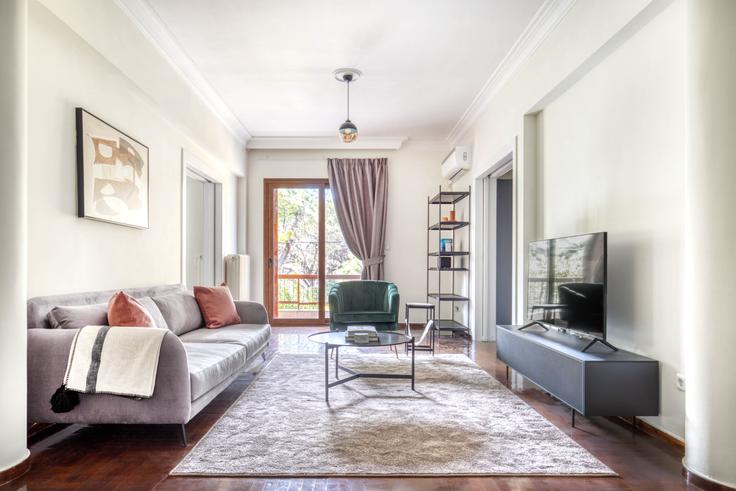 Elegantly designed living room with modern furnishings in an apartment at Chaoulant I in Psychiko, Athens