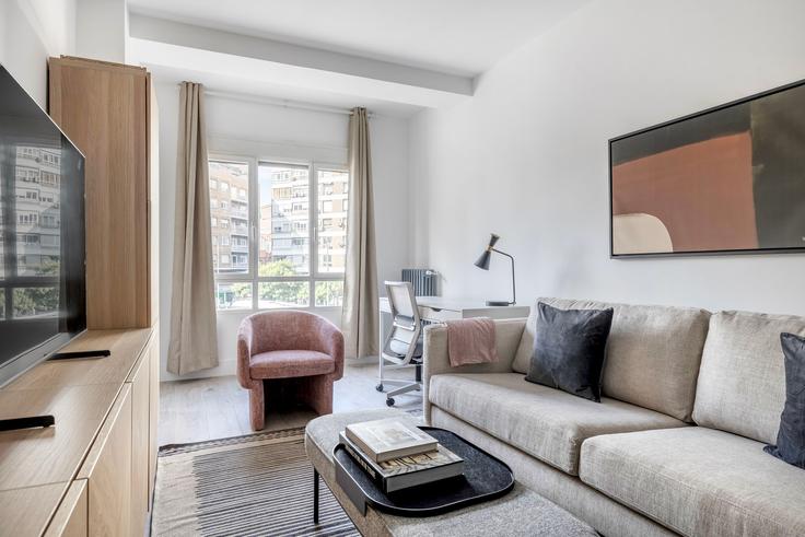 Elegantly designed living room with modern furnishings in an apartment at Conde de Peñalver 96 in Lista, Madrid