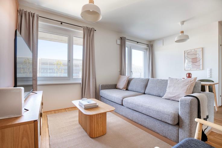 Elegantly designed living room with modern furnishings in an apartment at Kay Stiege 1 in 20th district - Brigittenau, Vienna