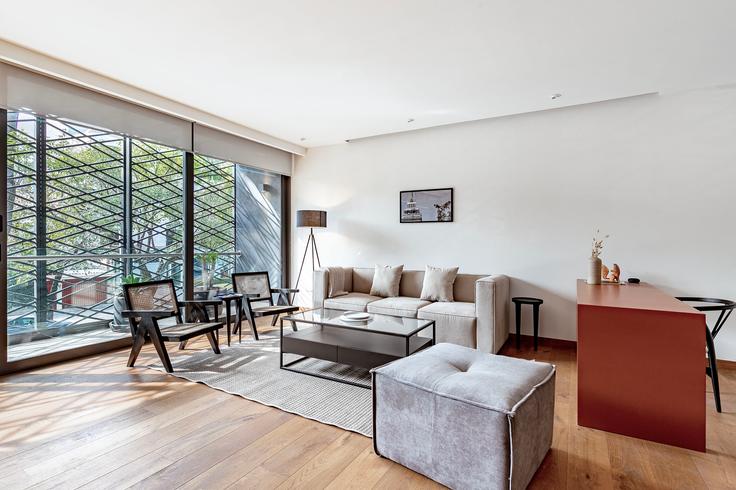 Elegantly designed living room with modern furnishings in an apartment at Aristoteles 103 in Polanco, Mexico City