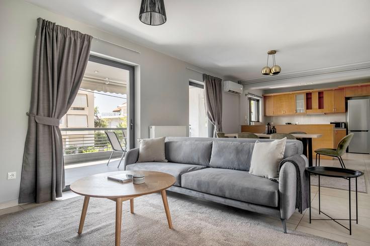 Elegantly designed living room with modern furnishings in an apartment at Odissea Androutsou VI in South Athens, Athens Elegantly designed living room with modern furnishings in an apartment at Odissea Androutsou VI in South Athens, Athens