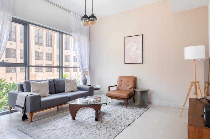 Elegantly designed living room with modern furnishings in an apartment at Bellevue Tower 2 in Downtown Dubai, Dubai