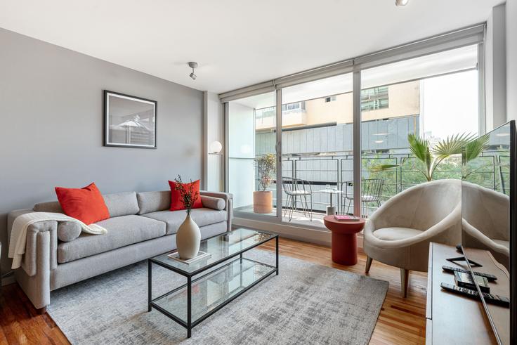 Elegantly designed living room with modern furnishings in an apartment at Homero 1433 in Polanco, Mexico City