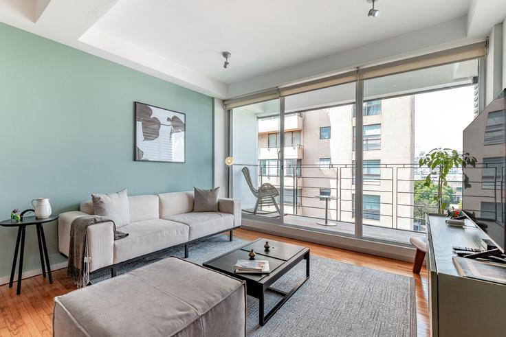 Elegantly designed living room with modern furnishings in an apartment at Homero 1433 in Polanco, Mexico City