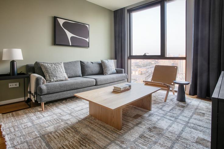 Elegantly designed living room with modern furnishings in an apartment at Nuhoğlu Yenitepe in Yenitepe, Istanbul