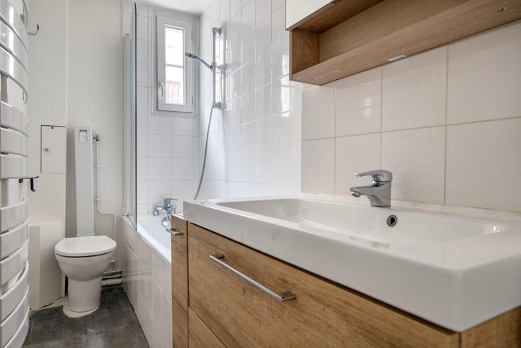 Refined and beautifully designed bathroom with sophisticated touches at Delta 12 in 9th arrondissement, Paris