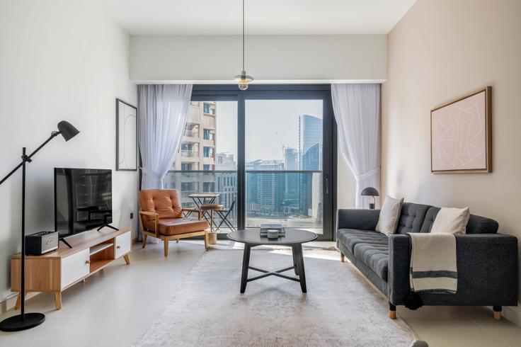 Salle de séjour élégante avec mobilier moderne dans un appartement à Act one act two tower à Downtown Dubai, Dubai Salle de séjour élégante avec mobilier moderne dans un appartement à Act one act two tower à Downtown Dubai, Dubai